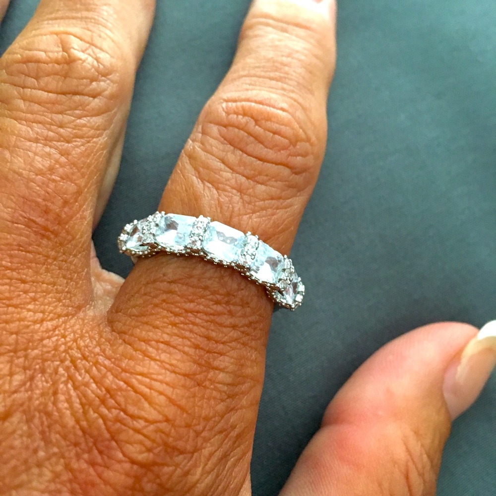 NWT blingy silver ring with many different sizes/shapes of cubic zirconia.